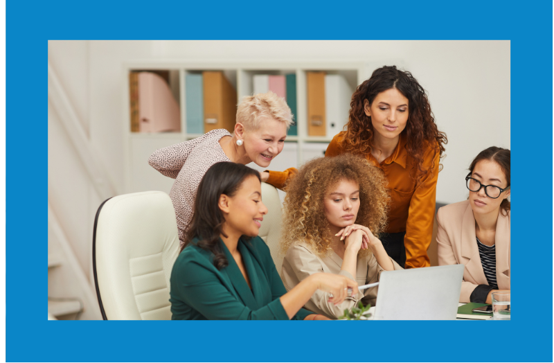5 ladies sitting at a table of a small business
